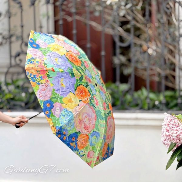 Ô cầm tay Racekish chống tia UV họa tiết hoa lá đẹp mắt dành cho những ai yêu thiên nhiên và hội họa.