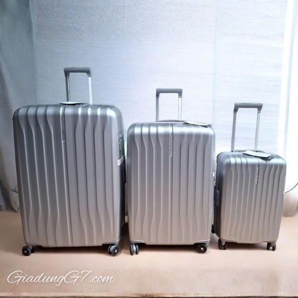 Vali Samsonite Uplift size 20cm/ 28cm/ 33cm - Màu Bạc vỏ cứng, có bánh xe 660 độ