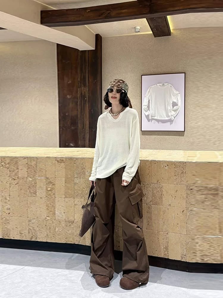 Quần túi hộp nâu phối sweater sáng màu