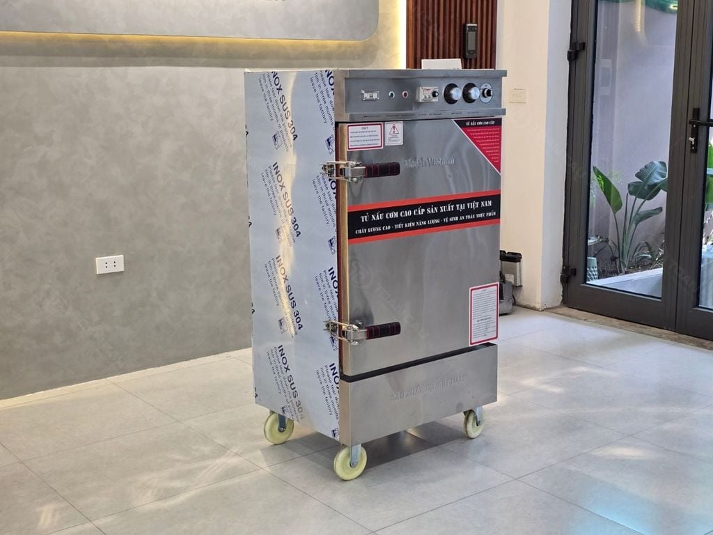Tủ hấp cơm 8 khay dùng điện thực tế