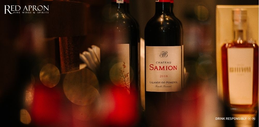 Chai rượu vang Chateau Samion Lalande de Pomerol nhà Berrouet, rượu vang Pháp màu đỏ ruby với hương gỗ sồi, trái cây đen, phù hợp làm quà tặng doanh nghiệp.