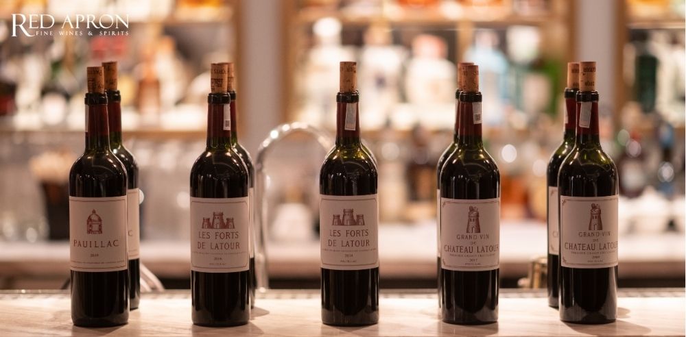 Dãy chai rượu vang Pauillac de Chateau Latour, Les Forts de Latour và Chateau Latour Grand Cru Classé các niên vụ 2018, 2016, 2014, 2010, 1976, trưng bày tại Red Apron với bảng giá tham khảo cho khách hàng.