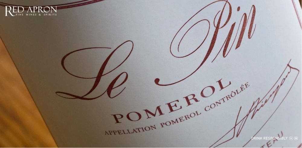 Chai rượu vang Le Pin Pomerol hiếm có, hương mâm xôi chín, truffle và gỗ sồi tinh tế.