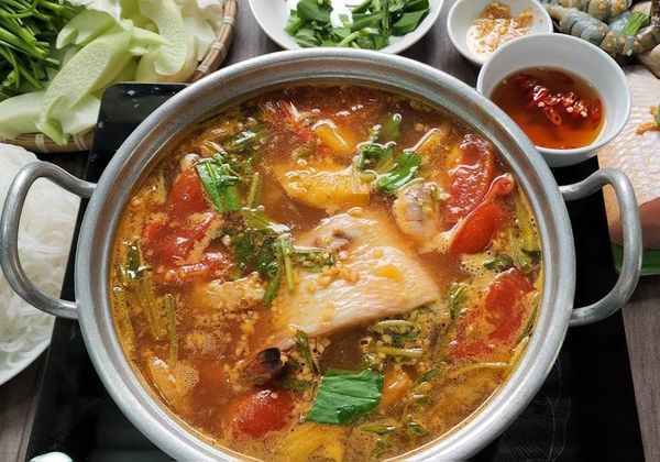 Cách nấu lẩu cá tầm chua cay đậm đà cho bữa tiệc sum họp