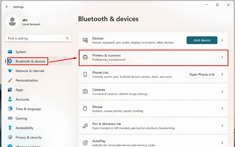 Chọn Bluetooth & devices > Printers & scanners
