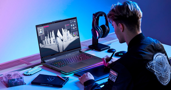 Người làm thiết kế dùng laptop