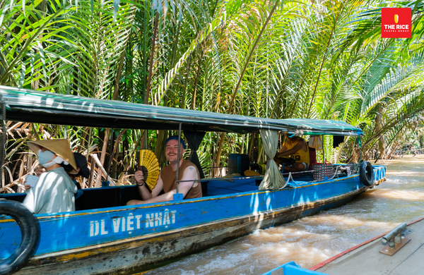 The boat passed through lush, cool mangrove trees