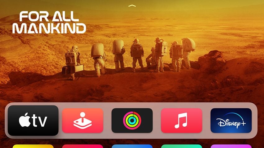 Apple TV home interface with “For All Mankind” banner.