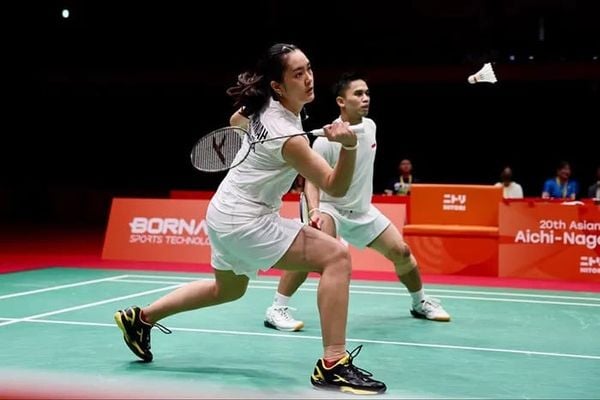 Amri Syahnawi/Nita Violina Marwah Đánh cầu