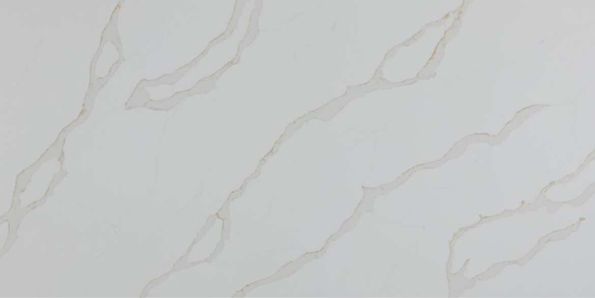Calacatta Lava Gold features a bright white background accented with smooth flowing gold veining, bringing a warm, refined elegance that enhances both modern and classic interior designs.