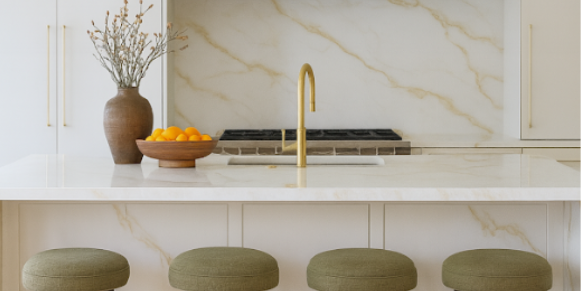 Calacatta Polaris features a bright white background accented by soft, elegant veins available in both cool grey and warm gold tones. Its smooth, flowing movement brings a refined, luxurious look suitable for modern kitchens, islands, and upscale interior designs.