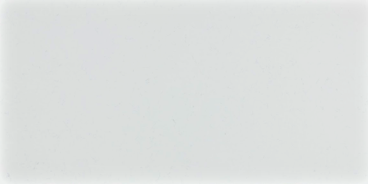 Carrara Ocean features a clean white background with soft, scattered grey veining that adds gentle movement and a natural marble-inspired look. Its subtle pattern makes it versatile and ideal for modern kitchens, bathroom vanities, and minimalist interior designs.