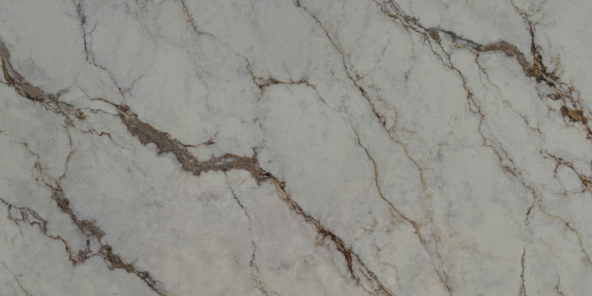 Lyra quartz slab with bold brown veining on a warm ivory base.