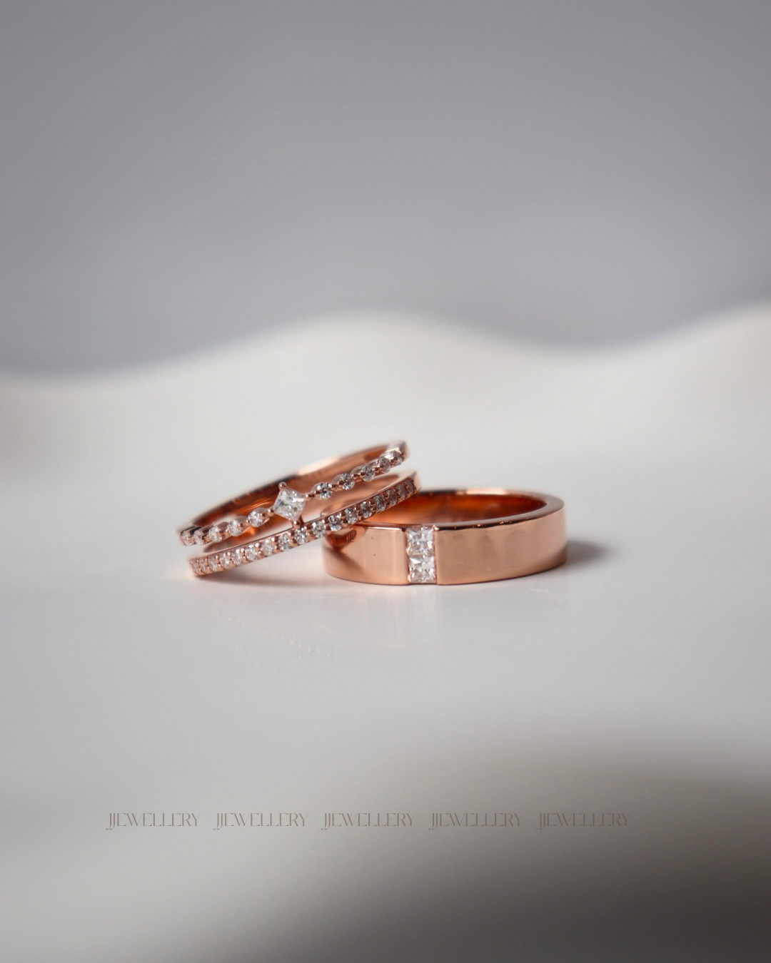 Custom wedding bands with individual widths and diamond details