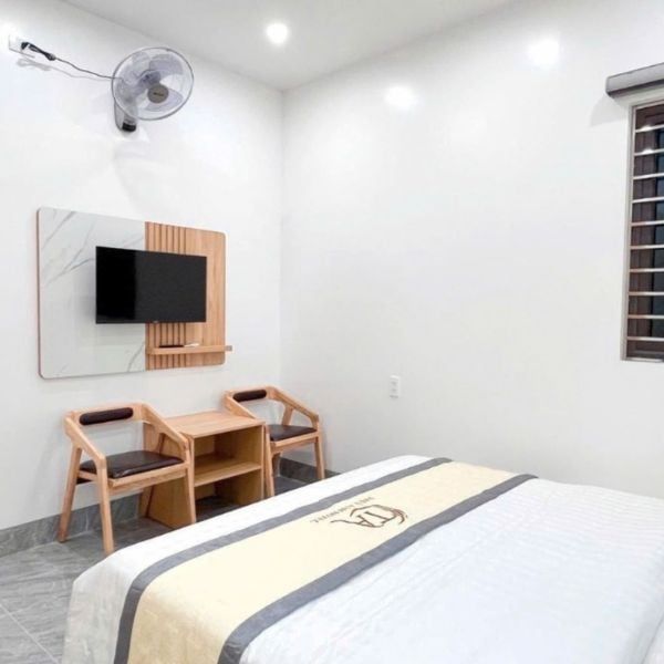 Free private room space at Hagiangtrips hotel in Ha Giang, featuring a modern and clean design, fully equipped with a TV and air conditioning