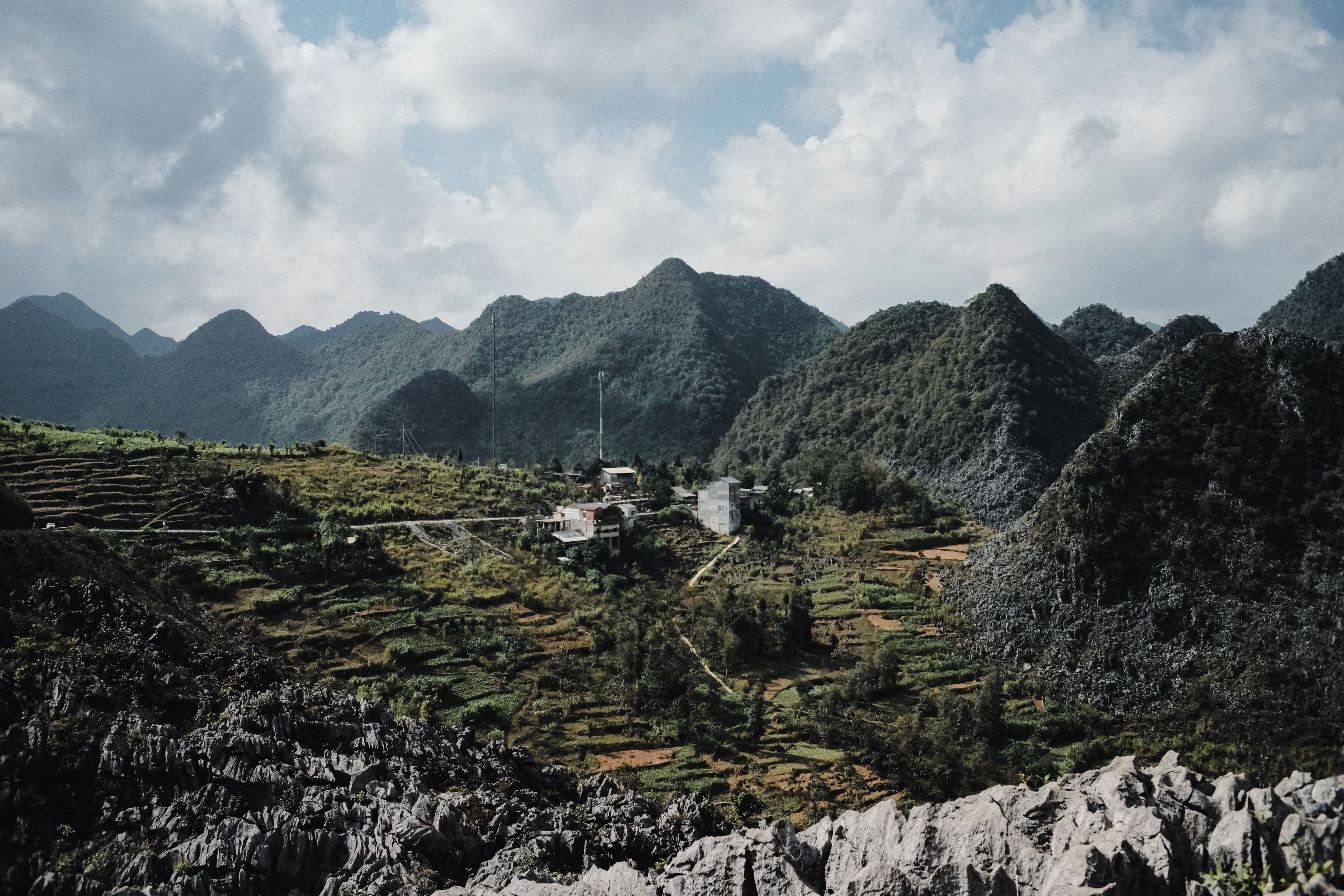 Private motorbike tour riders at Ha Giang Loop mountain viewpoint