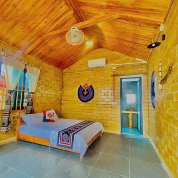 Authentic earthen-wall private room at Tomtep Homestay in Yen Minh for 4-day private tour.
