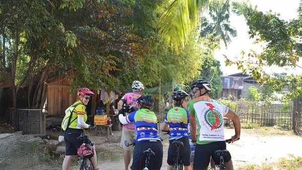 CYCLING THROUGH VILLAGES ALONG THE MEKONG IN LAOS