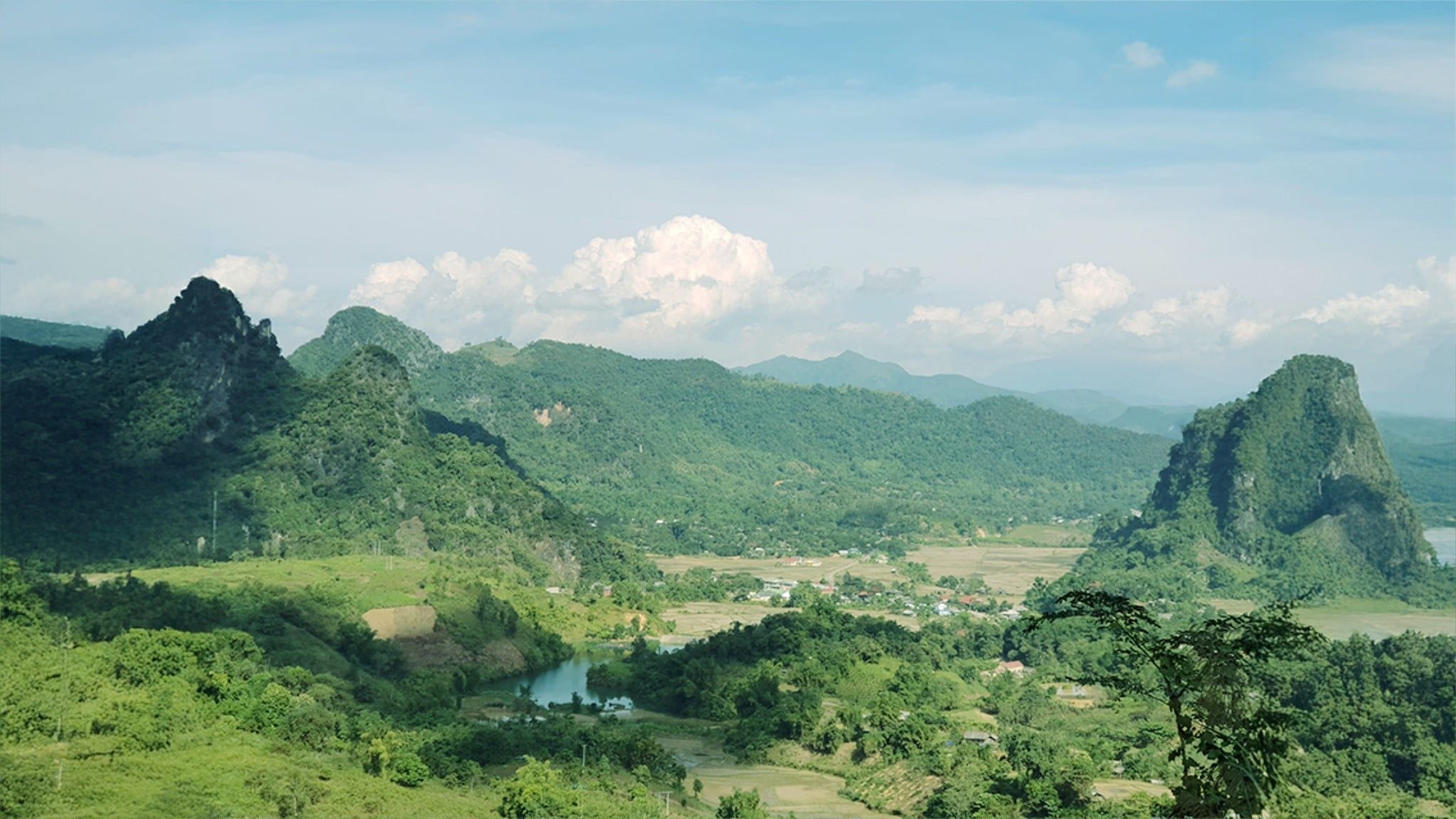 BICYCLE TOUR VIETNAM TO LAOS: ADVENTURE CYCLING THROUGH GREEN HILLS AND QUIET RIVERS