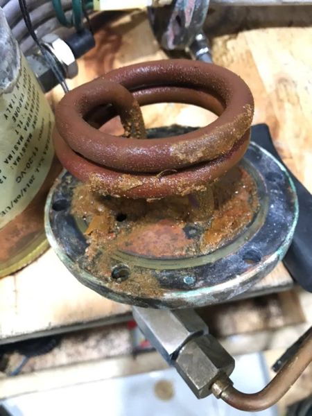 Đóng cặn boiler máy espresso