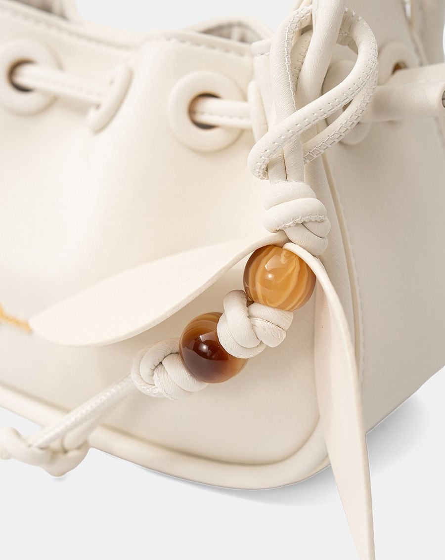  Túi Xách Nhỏ Rút Dây Phối Charm 