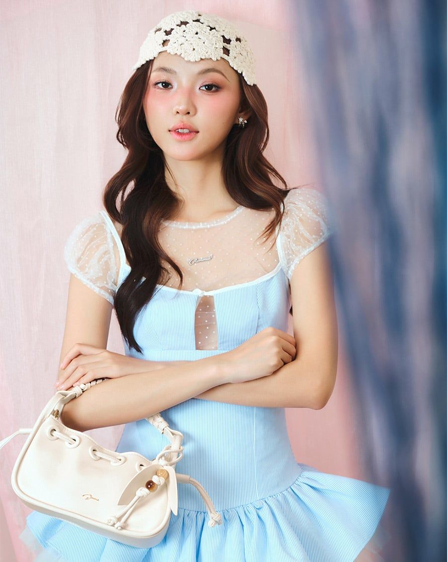  Túi Xách Nhỏ Rút Dây Phối Charm 