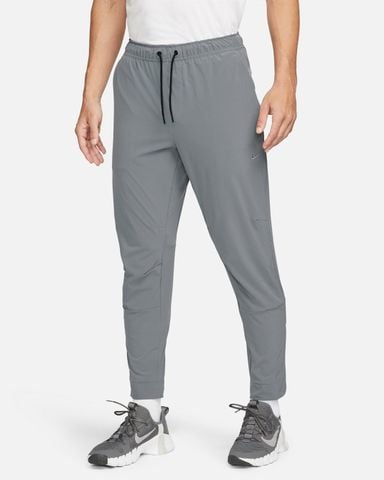 Nike - Quần Dài Thể Thao Nam Nike Unlimited Men's Dri-FIT Zippered Cuff Versatile Pants