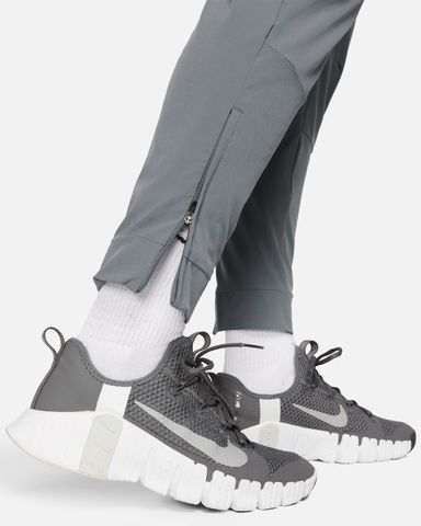 Nike - Quần Dài Thể Thao Nam Nike Unlimited Men's Dri-FIT Zippered Cuff Versatile Pants
