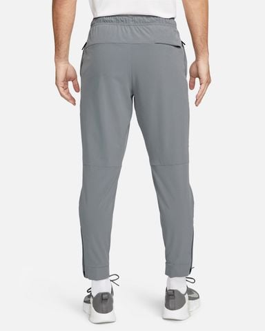Nike - Quần Dài Thể Thao Nam Nike Unlimited Men's Dri-FIT Zippered Cuff Versatile Pants