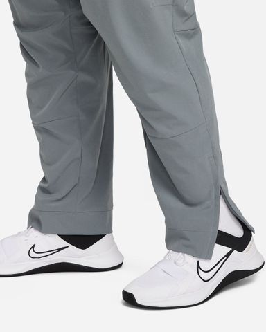 Nike - Quần Dài Thể Thao Nam Nike Unlimited Men's Dri-FIT Zippered Cuff Versatile Pants