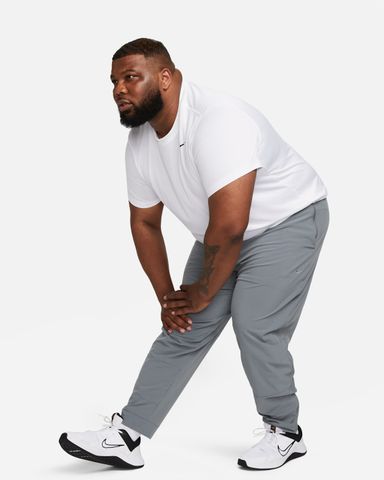 Nike - Quần Dài Thể Thao Nam Nike Unlimited Men's Dri-FIT Zippered Cuff Versatile Pants