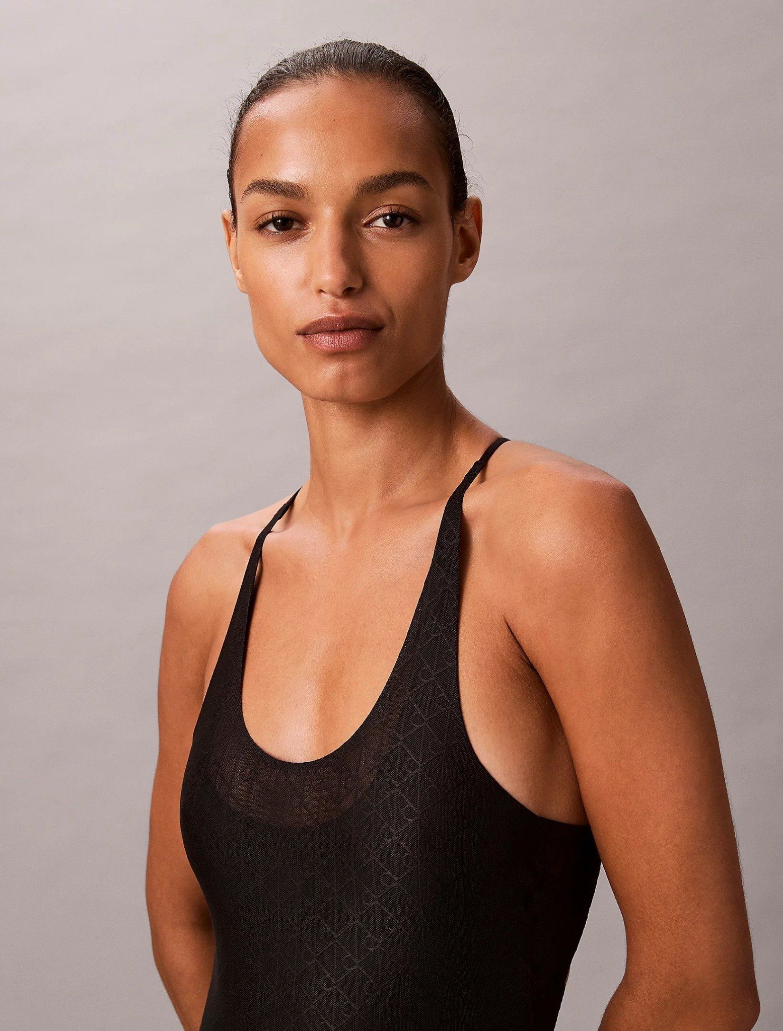 Calvin Klein - Áo liền quần thể thao nữ Monogram Logo Mesh Bodysuit