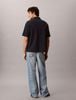 Calvin Klein - Áo Thun Có Cổ Nam Script Logo Graphic Pique Relaxed Polo Shirt