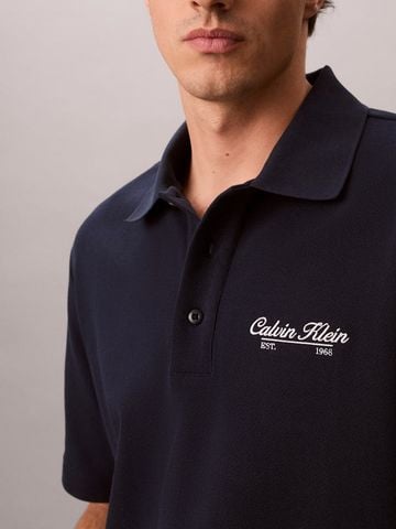 Calvin Klein - Áo Thun Có Cổ Nam Script Logo Graphic Pique Relaxed Polo Shirt