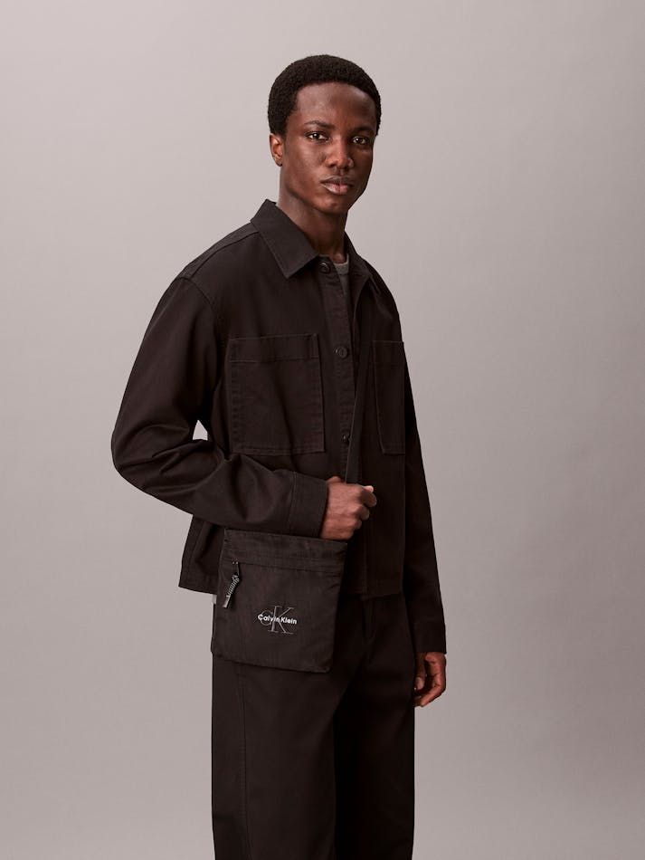 Calvin Klein - Túi đeo chéo nam Nylon Monogram Logo Flatpack