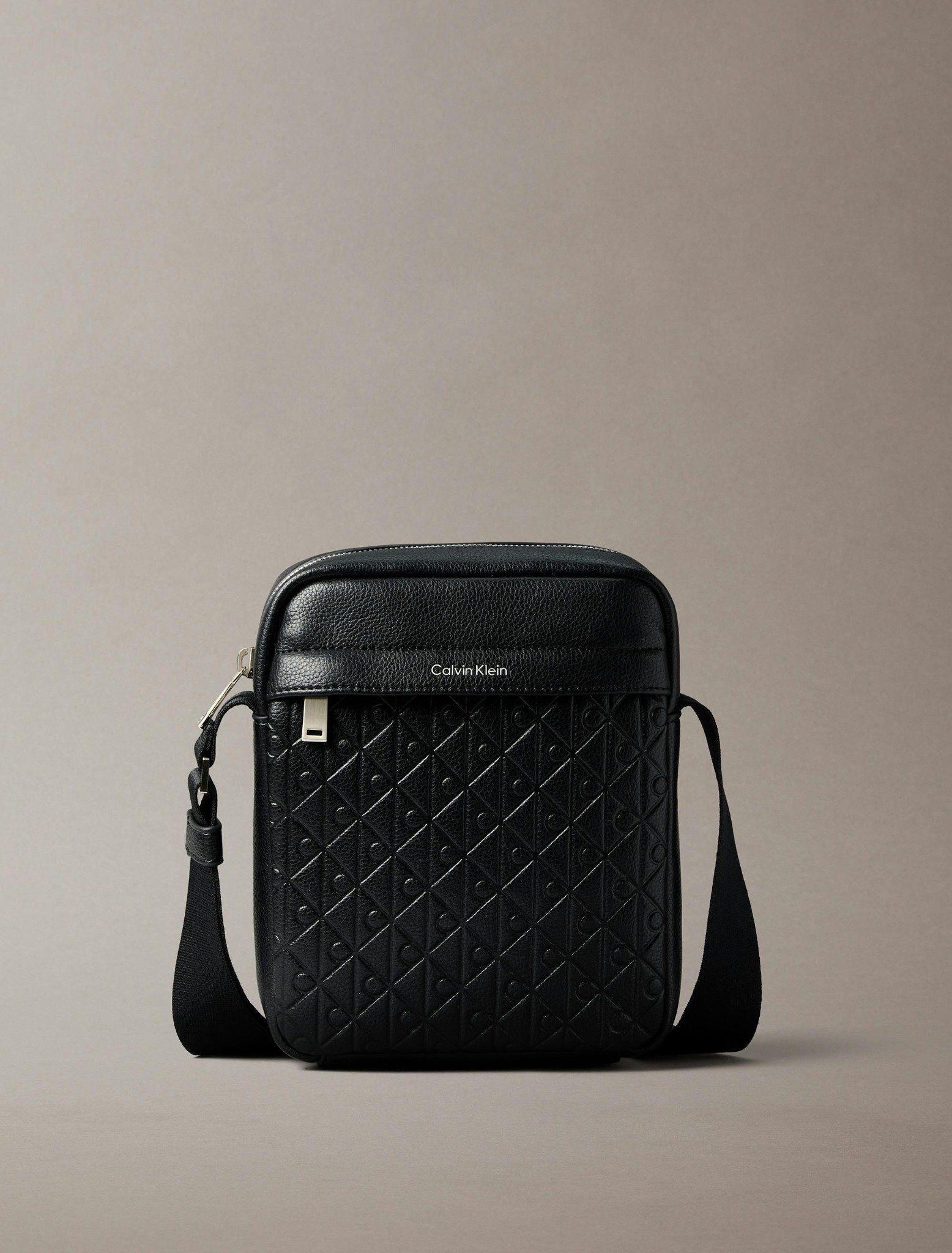 Calvin Klein - Túi đeo chéo nam Embossed Allover Monogram Reporter Bag