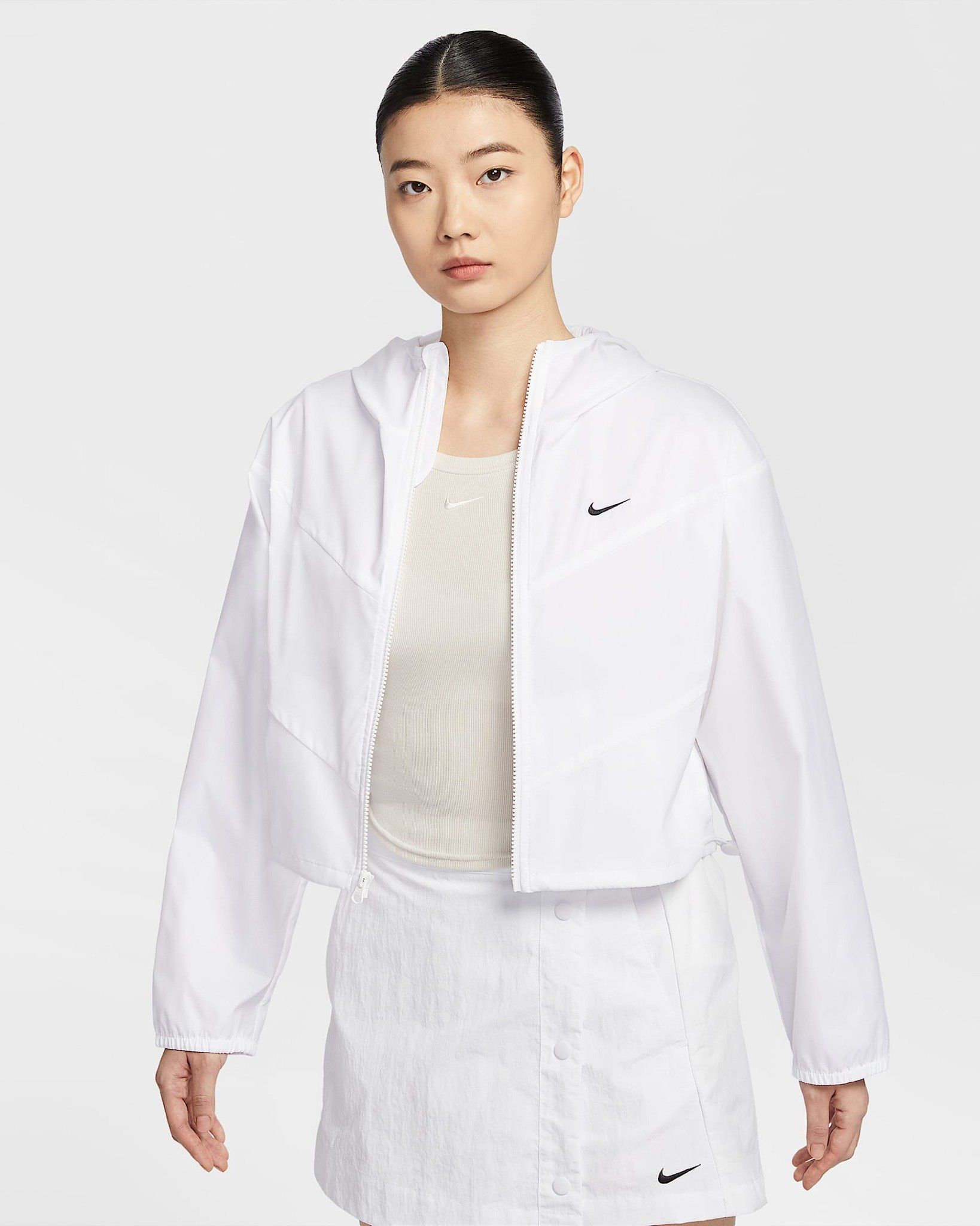 Nike - Áo khoác gió thể thao Nữ Sportswear Windrunner Women's Loose Woven Hooded Jacket