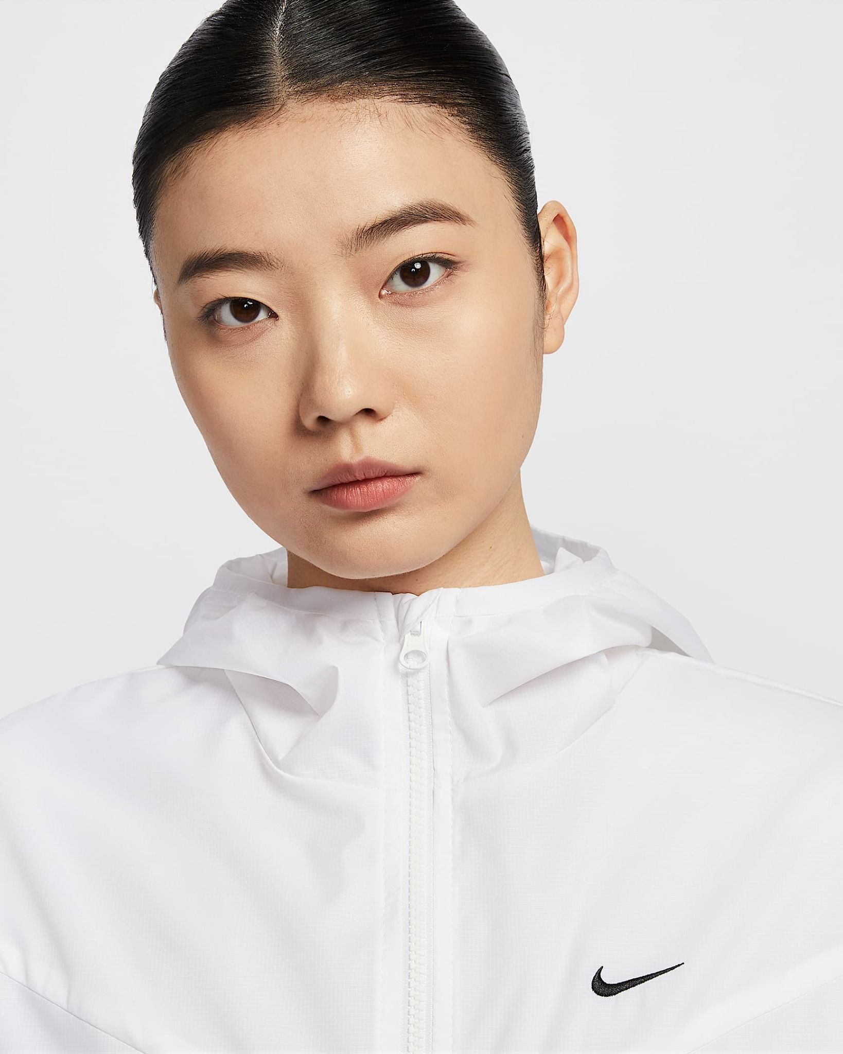 Nike - Áo khoác gió thể thao Nữ Sportswear Windrunner Women's Loose Woven Hooded Jacket