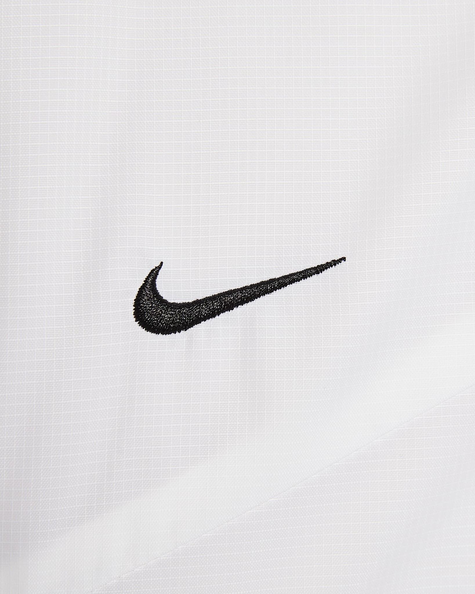 Nike - Áo khoác gió thể thao Nữ Sportswear Windrunner Women's Loose Woven Hooded Jacket
