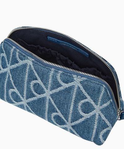 Calvin Klein - Túi Xách Cầm Tay Nữ Emblem Denim Beauty Case