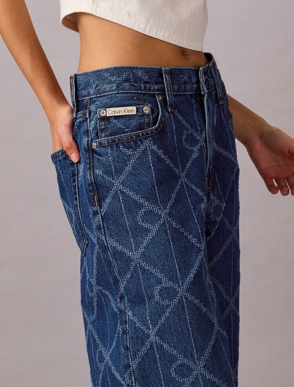 Calvin Klein - Quần jeans ống rộng nữ Allover Monogram Low Rise Baggy Jeans