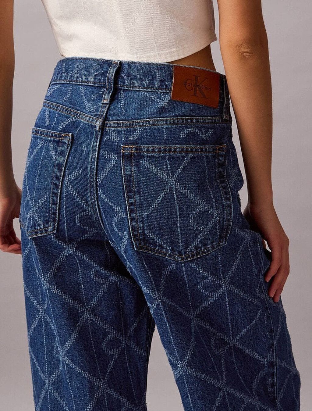 Calvin Klein - Quần jeans ống rộng nữ Allover Monogram Low Rise Baggy Jeans