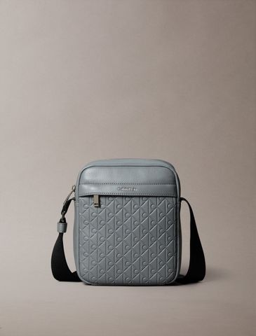 Calvin Klein - Túi đeo chéo nam Embossed Allover Monogram Reporter Bag