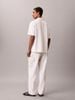 Calvin Klein - Áo Thun Có Cổ Nam Script Logo Graphic Pique Relaxed Polo Shirt