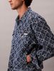 Calvin Klein - Áo khoác jeans nam Allover Logo 90's Denim Jacket