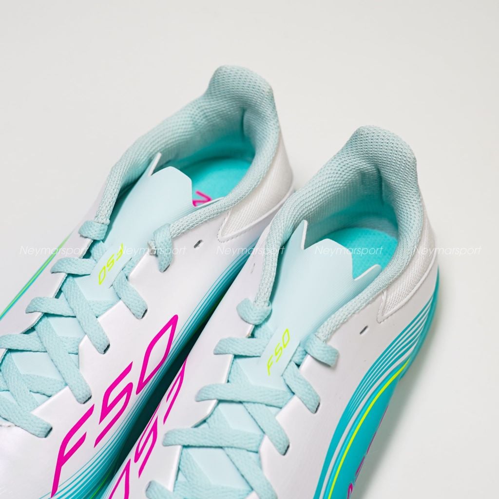 Giày đá bóng cỏ nhân tạo Adidas F50 Messi League TF - Ftwr White/Lucid Pink/Flash Aqua Kids JQ0944