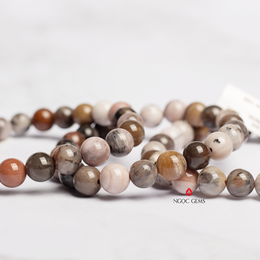 Vòng tay gỗ hoá thạch ngũ sắc