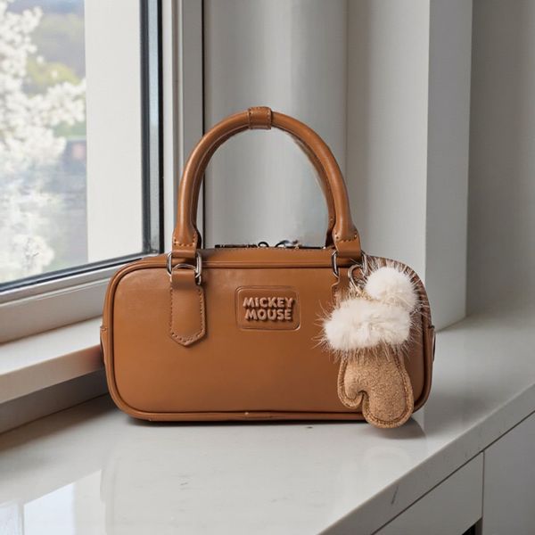 Túi xách DN A69 chữ nhật xách tay CĐC CHR / 22x12 / NÂU