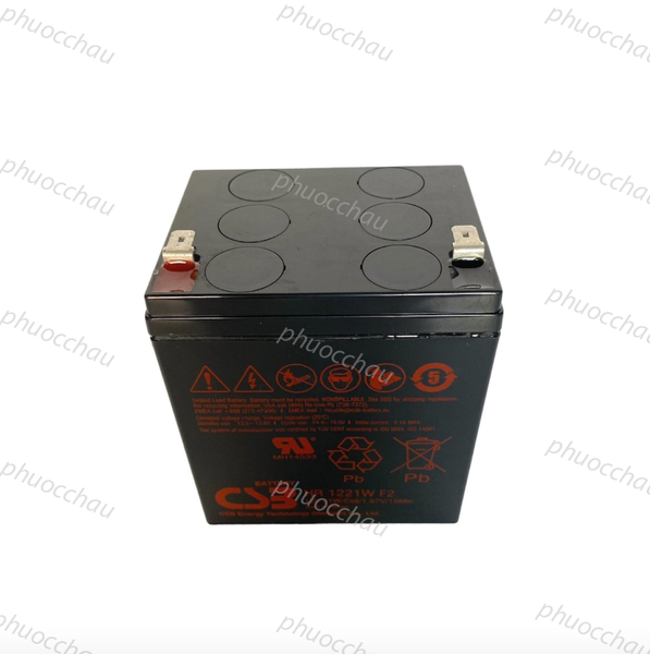 Bình ắc quy CSB HR1221WF2 12V 5Ah nhìn từ trên xuống, mặt trên đen có 6 nắp tròn và 2 cọc dẹt
