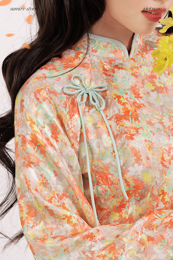 Áo dài tơ hoa Vân Đình - Cam viền xanh